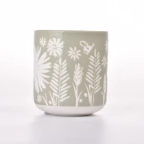 China newly design ceramic candle jars with flower pattern manufacturer