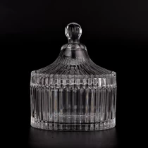 porcelana Frascos de velas de vidrio de línea vertical al por mayor con tapas para decoración del hogar fabricante