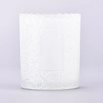 China Wholesale embossed glass candle jar with custom logo candle vessel for home decor manufacturer
