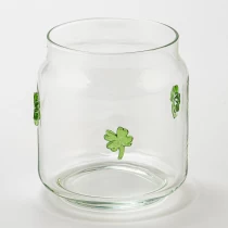 China Four Leaf Clover Embellish Clear Glass Candle Jar for Decoration manufacturer