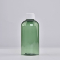 Kiina Kirkas vihreä eteeristen öljyjen muovipullo muovisella kierrekorkilla valmistaja