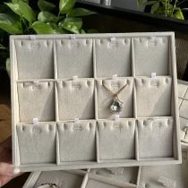 China velvet jewelry display tray stackable earring/pendant display tray movable pendant display pad manufacturer