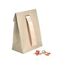 China Yadao handmade CMYK printing paper bag gift packaging bag with custom logo and ribbon clousure manufacturer