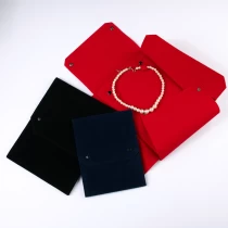 China Fanai customized jewelry packaging bag velvet microfiber travel pouch easy carry pouch with snap closure manufacturer