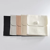 China Custom Snap Jewelry Pouch with Debossed Logo Velvet Pouch Jewelry Gift Packaging manufacturer