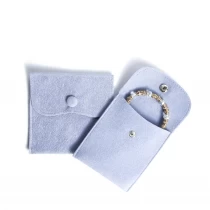 China Different Shape Jewelry Pouch Granular Velvet Jewelry Pouch with Your Store Name manufacturer