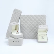 China Popular Design Jewelry Box with Stitching Pu Leather Jewellery Box Wholesale manufacturer