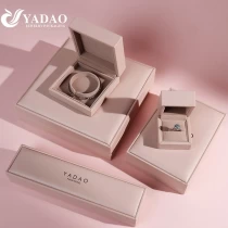 China Pink pu leather classic style accessory ring necklace jewelry packaging plastic box manufacturer