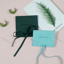 Chine Noël sac cadeau vert arc savoir conception bijoux emballage pochette usine boucles d'oreilles sac d'emballage avec logo fabricant