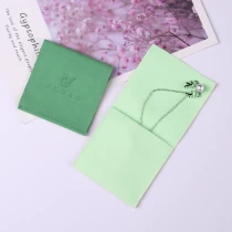 Čína cukroví zelená malá kapsička továrna fluorescenční zelená taška na šperky dodavatel obálka z mikrovlákna kapsička výrobce
