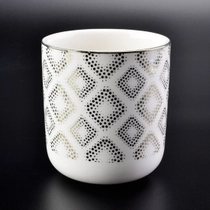 Cina 12 candele di ceramica oz, di colore bianco, a struttura dorata produttore