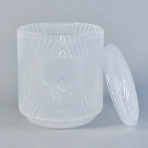 China Popular Embossed Glass Candle Jars With Lids manufacturer