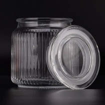 China New 600ml vertical stripe glass candle holder with clear glass lids manufacturer