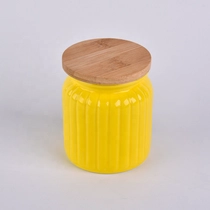 China 6oz Yellow ceramic candle holder with lids for home decoration manufacturer