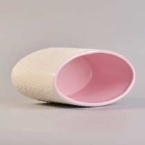 China Oval shape ceramic candle holder decorative ceramic candle vessel manufacturer
