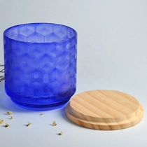 China New design decorative glass candle jars with lids suppliers manufacturer