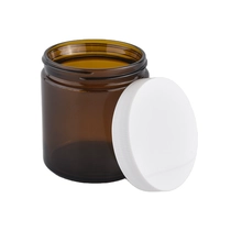 China Factory price tealight amber candle glass jar with white cover manufacturer