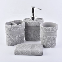 China 4ps towel-shaped ceramic bathroom accessories sets tumbler hotel decor wholesale manufacturer