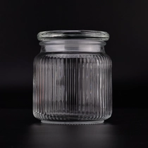 China Hot sale 600ml vertical line glass jar with matched glass lids for home deco manufacturer