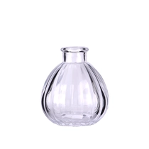 China Transparent Round Glass Bottle for Fragrance Diffuser wholesale manufacturer