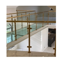 Chine Garde-corps en verre de poteau de finition d'or d'acier inoxydable fait sur commande garde-corps d'intérieur moderne de l'escalier SS304 SS316 fabricant