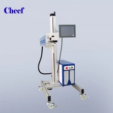 China food industrial effective flying CO2 laser marking machine printing for food plastic packing bags with one line manufacturer