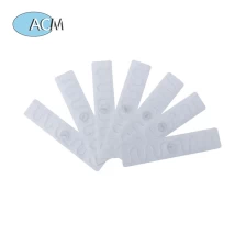 China 860-960MHz Woven White UHF Clothing RFID Laundry Tag for apparel Garment Tracking manufacturer