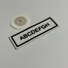 China Iron-On Fabric Woven nfc tag for clothing NTAG213 Washable nfc cloth label manufacturer