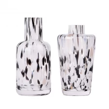 China Handmade colorful spot glass aromatherapy reed diffuser fragrance glass bottle wholesale manufacturer