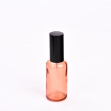 China 50ml 100ml transparent pink glass bottle with shiny black cap for supplier manufacturer