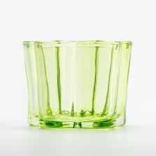 China 140ml transparent green color glass candle vessel home decor manufacturer