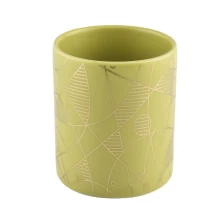 China Home decoration cylinder print golden empty ceramic candle jars manufacturer
