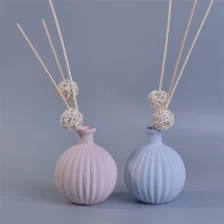 China ceramic 250ml luxury aroma oil empty reed diffuser glass bottle flower reeds for home wedding party manufacturer