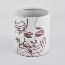 China New Arrival Ceramic Candle Jars With Face Pattern manufacturer