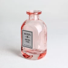 China Oblate Flask Rosa Glas-Diffusorflaschen mit Etiketten Hersteller