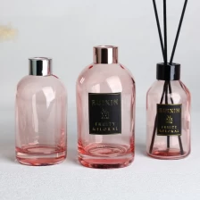 China Runde rosa Diffusorflaschen mit Etiketten, Kappen und Schraubverschluss Hersteller