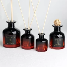 porcelana Botellas difusoras redondas de color rojo degradado a negro con etiquetas y cuello en T fabricante