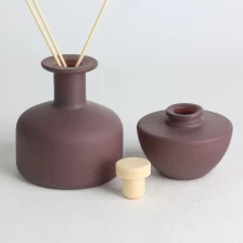 China Brown Frosted Opaque Sprayed Glass Diffuser Bottle Set with Wooden Caps manufacturer