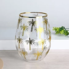 China gold rim stemless wine glass tumblers with palm pattern decals manufacturer