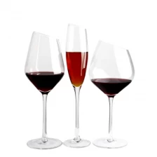China wholesale luxury clear glasses hand blown long stem slanted champagne flutes wine glasses set goblets manufacturer