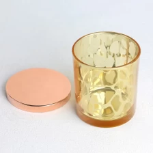 Çin Elektroliz lazer içi boş desen sarı cam mum kavanozu altın kapaklı kokulu mumlar üretici firma