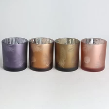 China electroplated spray color opaque laser hollow feathers pattern red and golden glass candle jar with lid manufacturer
