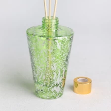 China Frasco difusor de vidro com acabamento em manchas de laser galvanizado verde transparente fabricante