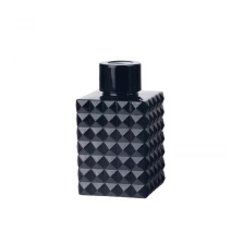 China Custom 100ml 3.5oz geo cut square opaque glossy black glass aroma reed diffuser bottle with lid manufacturer