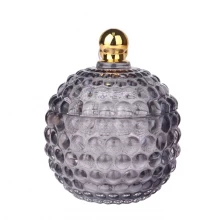 China 3oz 8oz colored transparent grey hobnail glass candle jar with gold tip lid manufacturer