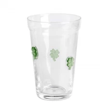 China Handmade clear 12oz beer beverage glass drinking tumbler with Clover 3D inlay decoration manufacturer