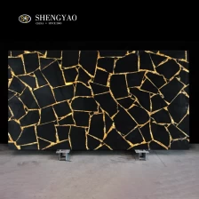 Chine Polissage de la dalle des pierres précieuses obsolènes noires avec une feuille d'or fabricant