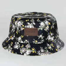 China Floral bucket hat with leather logo manufacturer