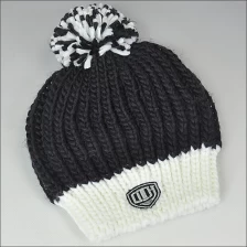 China knitted baggy beanie knitted cap / hat with a ball manufacturer