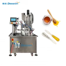 China China Dession 7g 10g Honey Spoon Filling Sealing Machine With Automatic Feeding System fabrikant